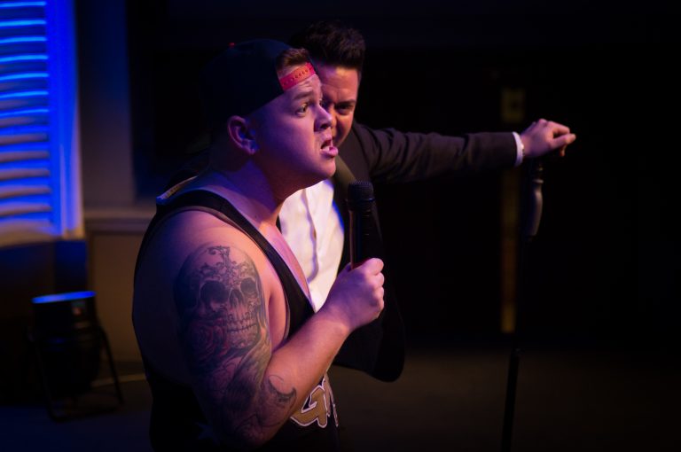 Grado explains how he's going to "wrestle" cash donations from the audience.