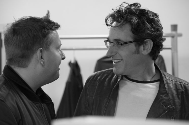 Tom and Greg check out each others acne.