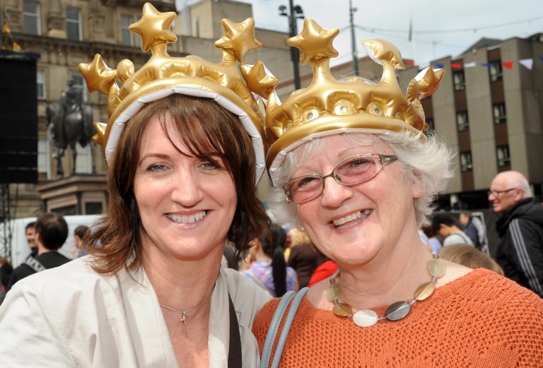 Two members of the audience in all their crowning glory.