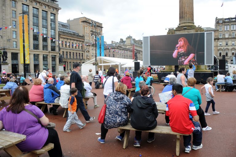 Crowds gathering for the afternoon show, opened by...