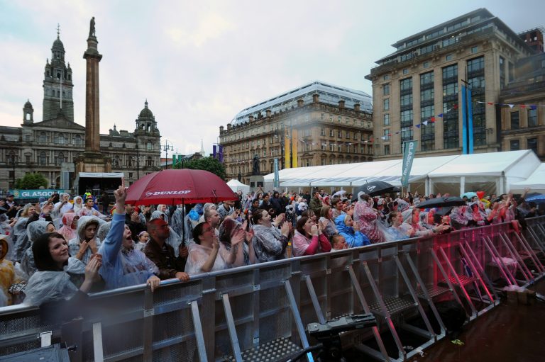 Even the start of the Scottish monsoon season didn't deter the crowds.